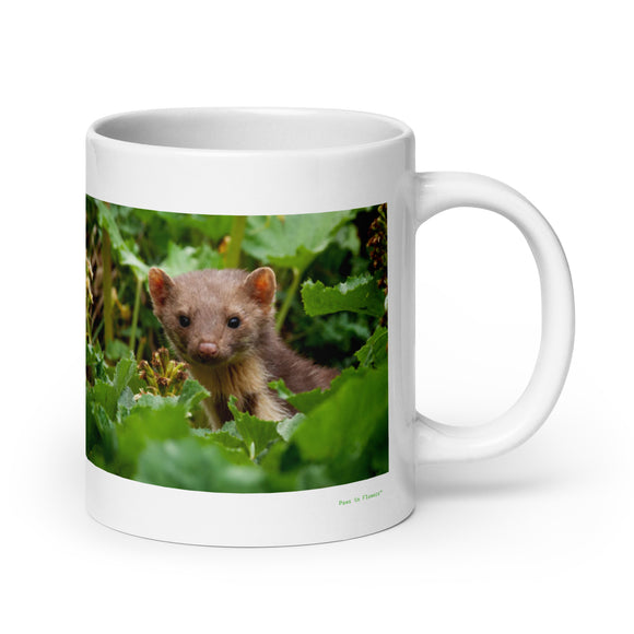 20 oz. white ceramic weasel  mug showing a weasel in its natural habitat