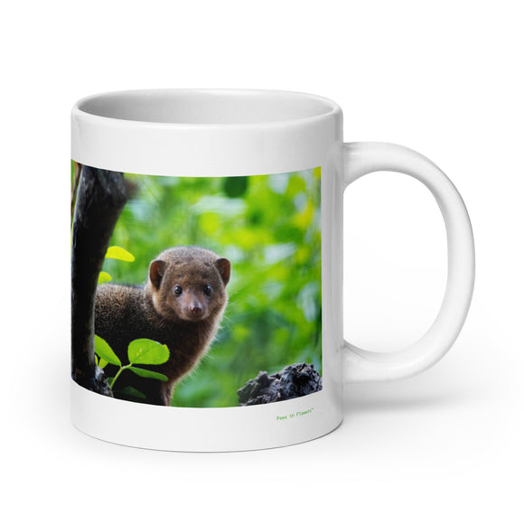 20 oz. white ceramic mongoose mug showing a mongoose in its natural habitat