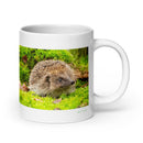 20 oz. white ceramic hedgehog mug showing a hedgehog in its natural habitat