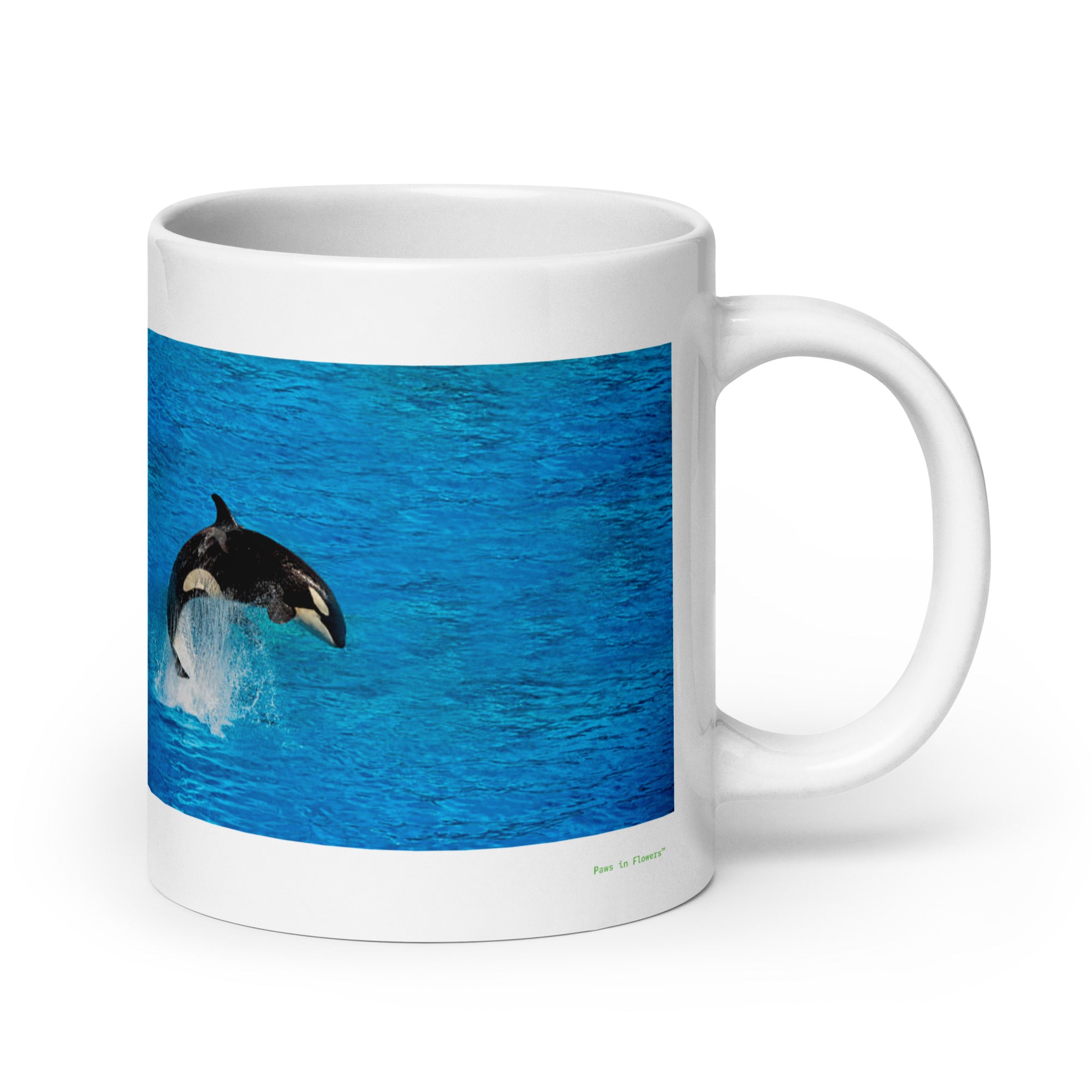 20 oz. white ceramic orca whale mug showing an orca whale in its natural habitat