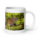 20 oz. white ceramic vole mug showing a vole in its natural habitat