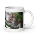 20 oz. white ceramic squirrel mug showing a squirrel in its natural habitat
