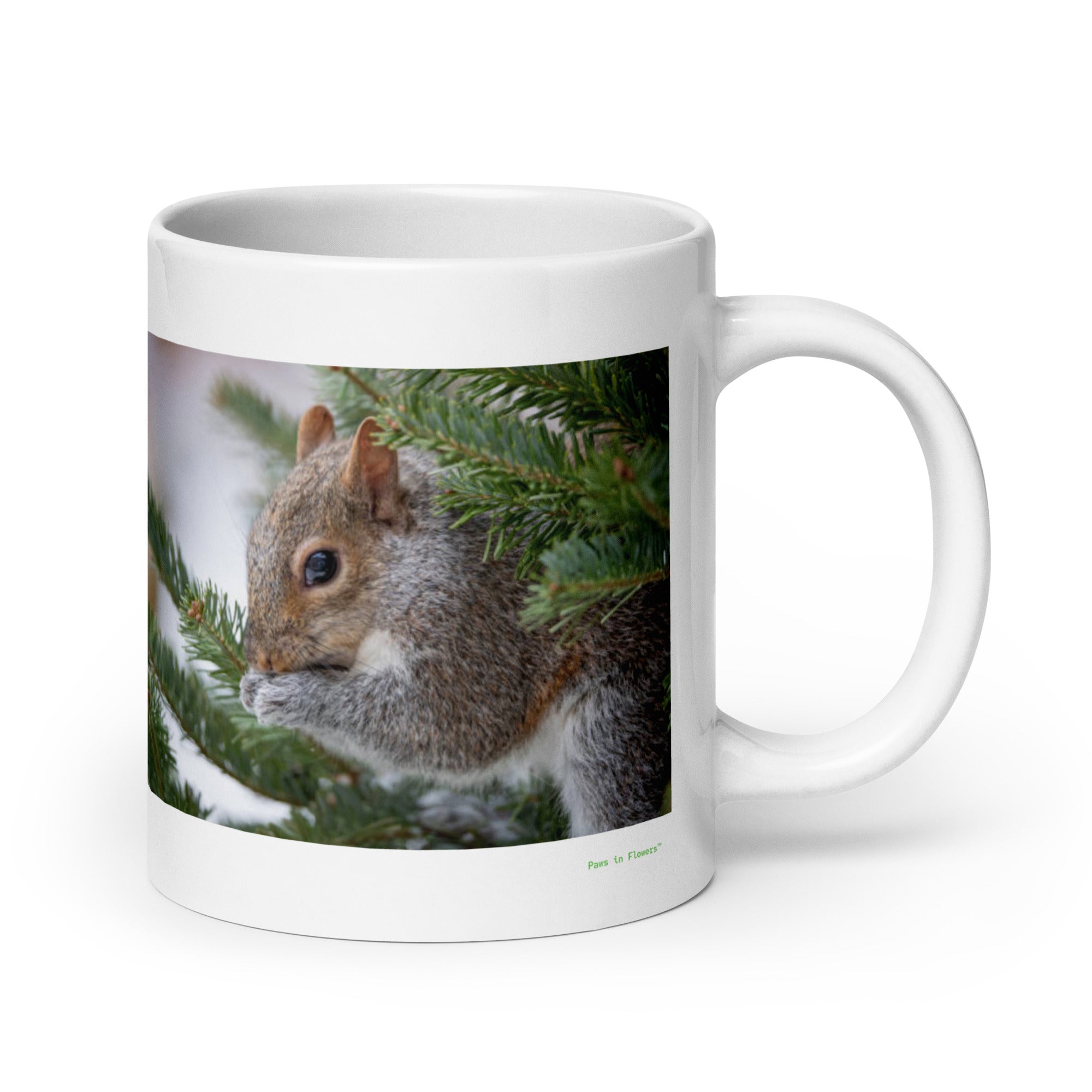 20 oz. white ceramic squirrel mug showing a squirrel in its natural habitat