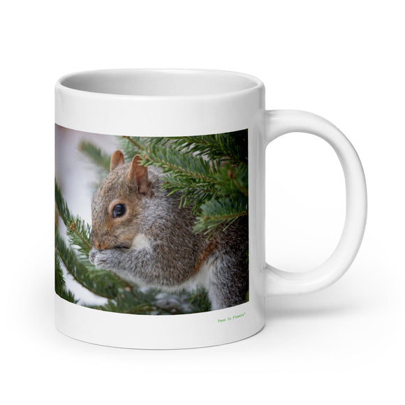 20 oz. white ceramic squirrel mug showing a squirrel in its natural habitat