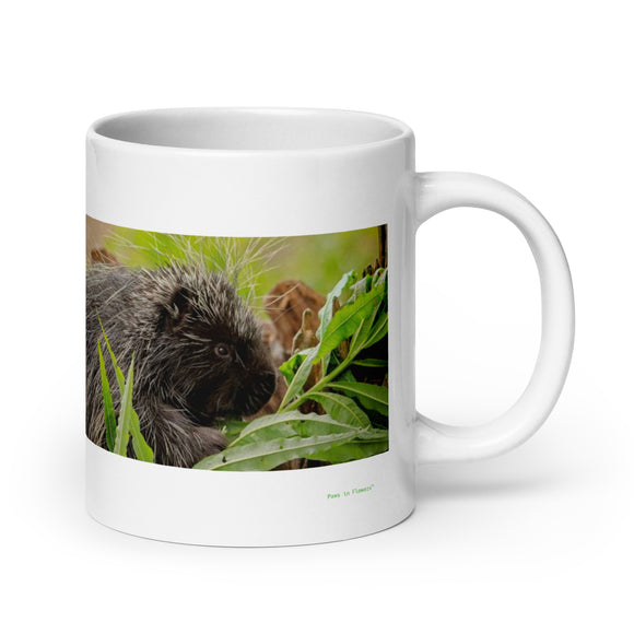 20 oz. white ceramic porcupine mug showing a porcupine in its natural habitat