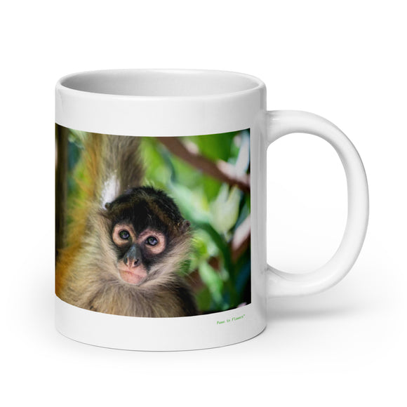 20 oz. white ceramic spider monkey mug showing a spider monkey in its natural habitat