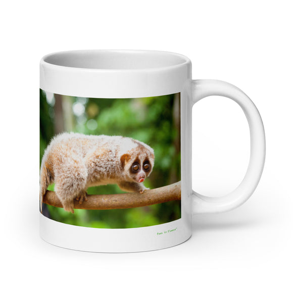 20 oz. white ceramic loris mug showing a loris in its natural habitat