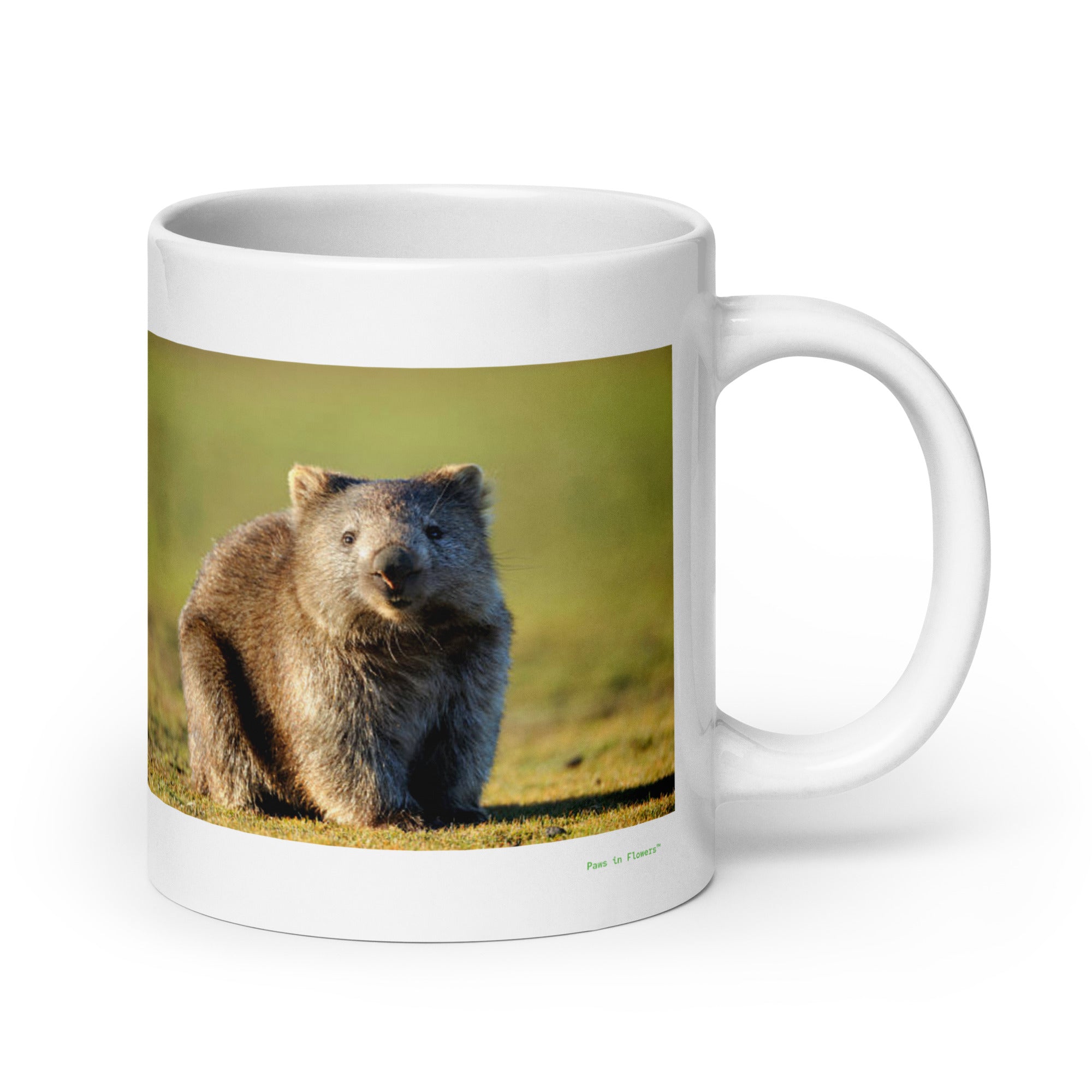 20 oz. white ceramic wombat mug showing a wombat in its natural habitat