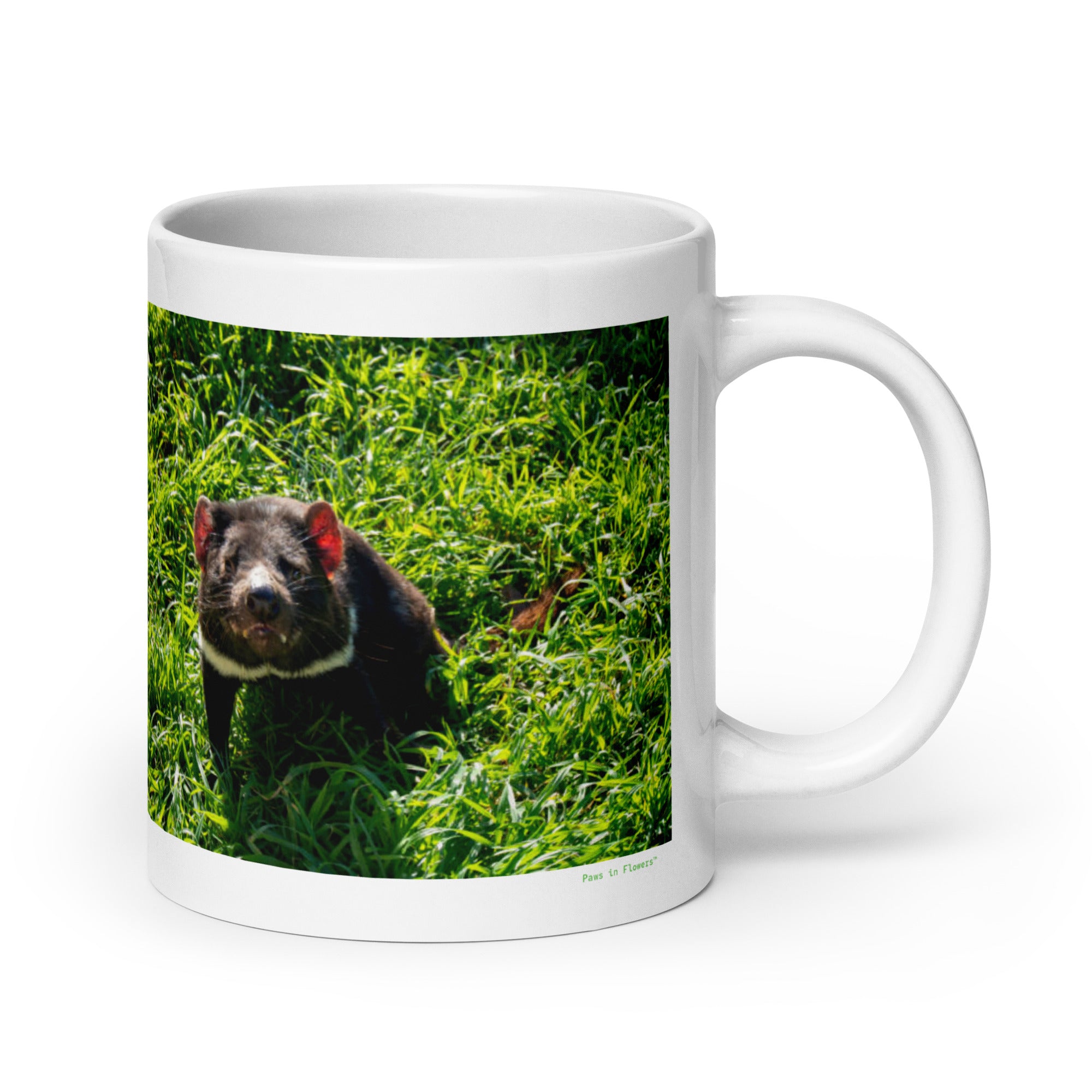 20 oz. white ceramic Tasmanian devil mug showing a Tasmanian devil in its natural habitat
