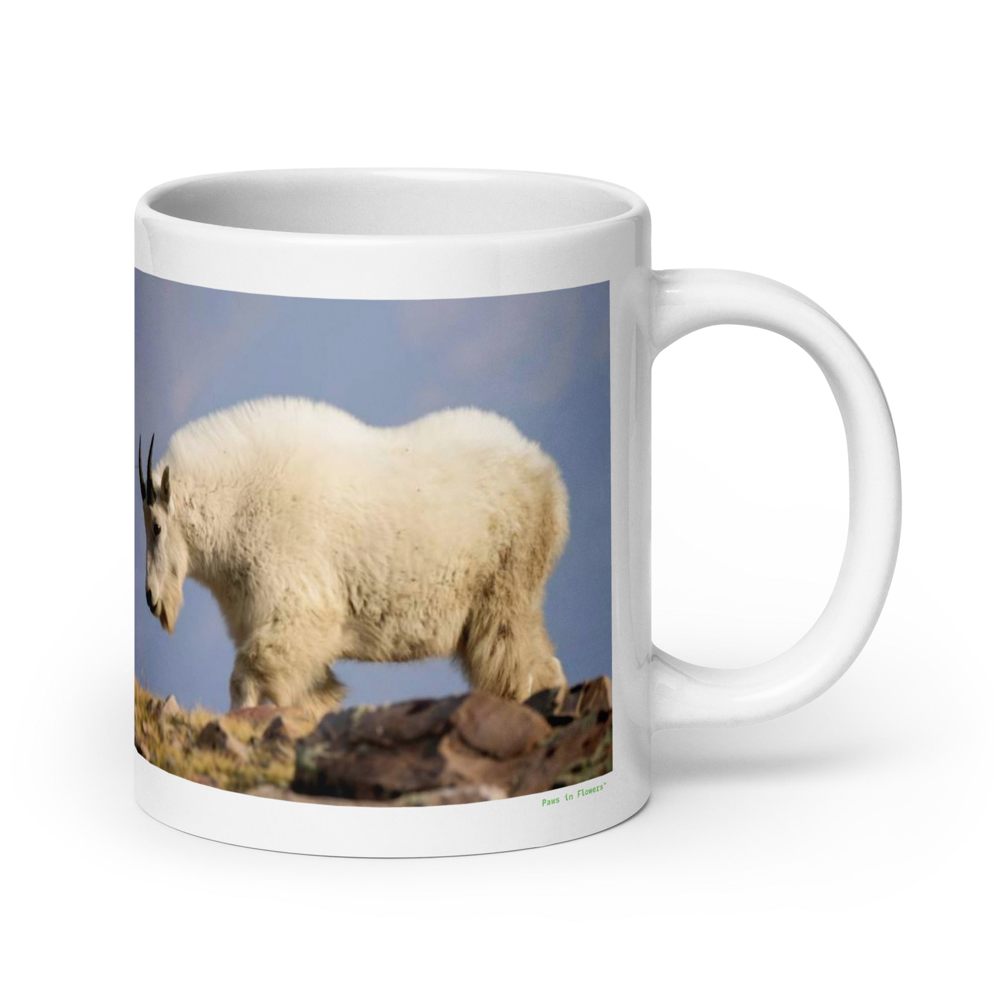 20 oz. white ceramic mountain goat mug showing a mountain goat in its natural habitat