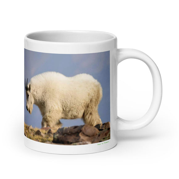 20 oz. white ceramic mountain goat mug showing a mountain goat in its natural habitat