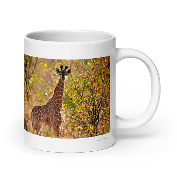 20 oz. white ceramic giraffe mug showing a giraffe in its natural habitat