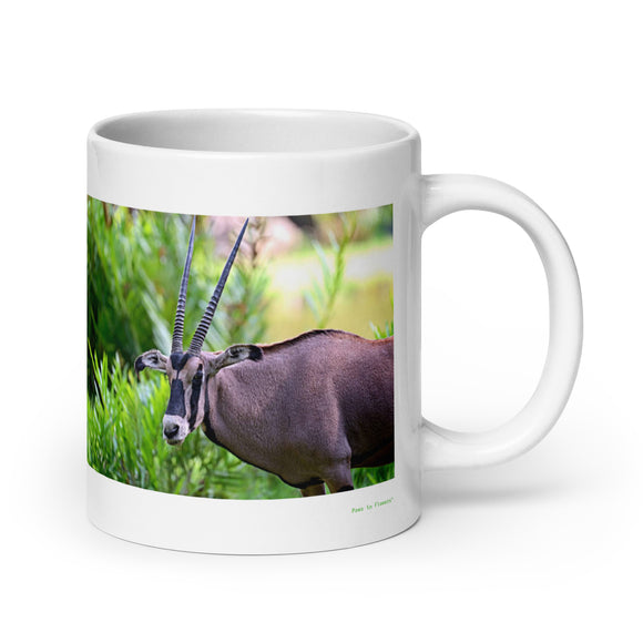 20 oz. white ceramic gemsbok mug showing a gemsbok in its natural habitat