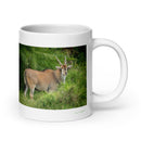 20 oz. white ceramic eland mug showing an eland in its natural habitat