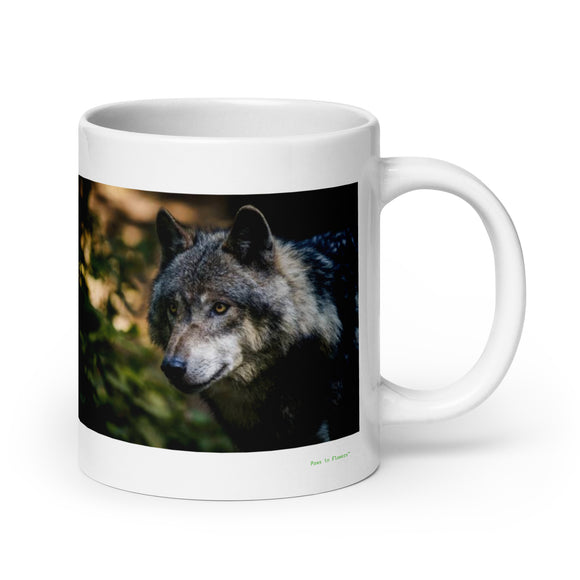 20 oz. white ceramic wolf mug showing a wolf in its natural habitat