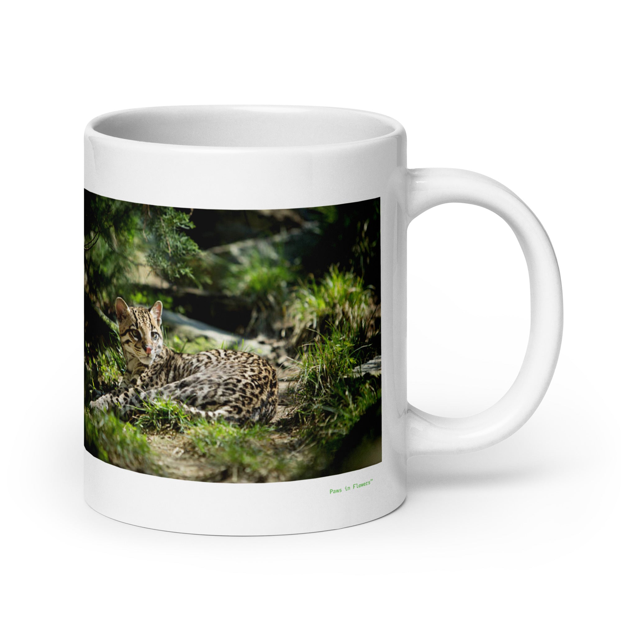 20 oz. white ceramic ocelot mug showing an ocelot in its natural habitat