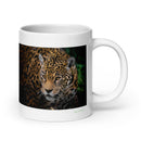 20 oz. white ceramic jaguar mug showing a jaguar in its natural habitat