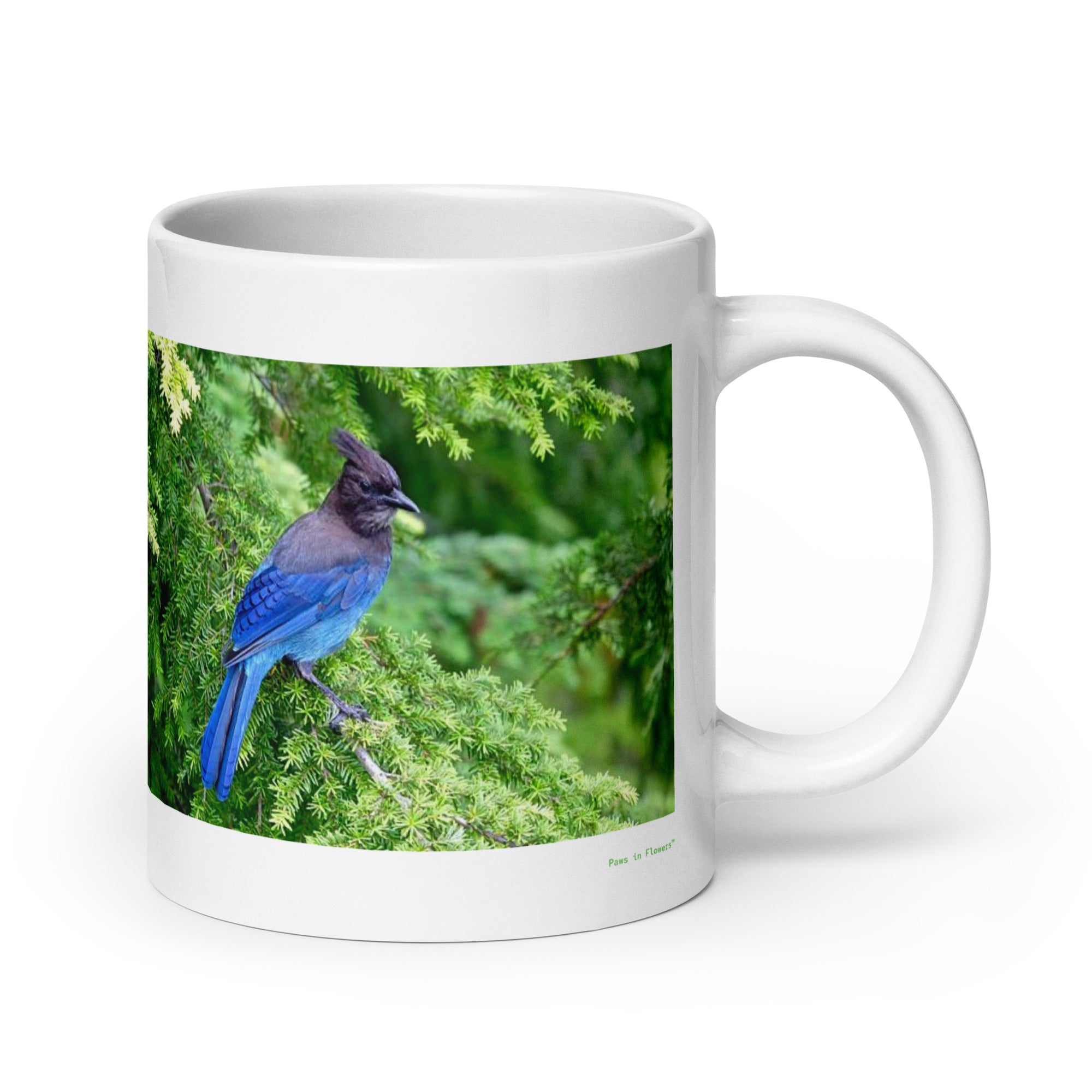 20 oz. white ceramic bluebird mug showing a bluebird in its natural habitat