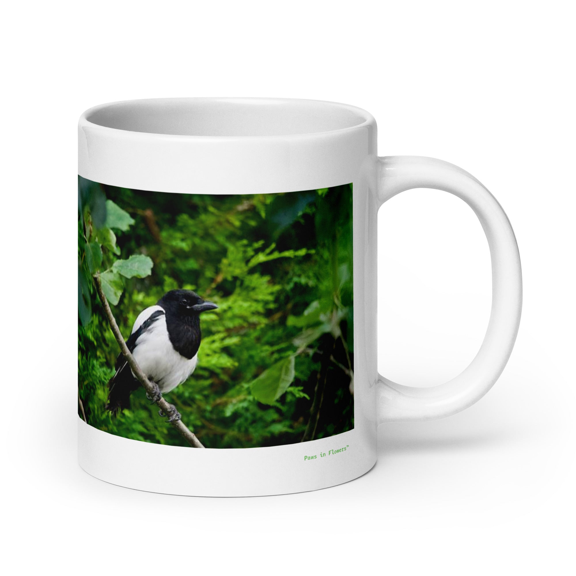20 oz. white ceramic magpie mug showing a magpie in its natural habitat