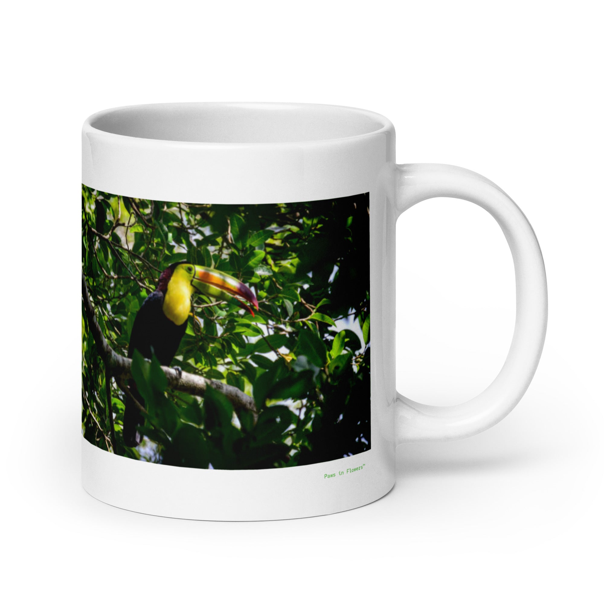 20 oz. white ceramic toucan mug showing a toucan in its natural habitat