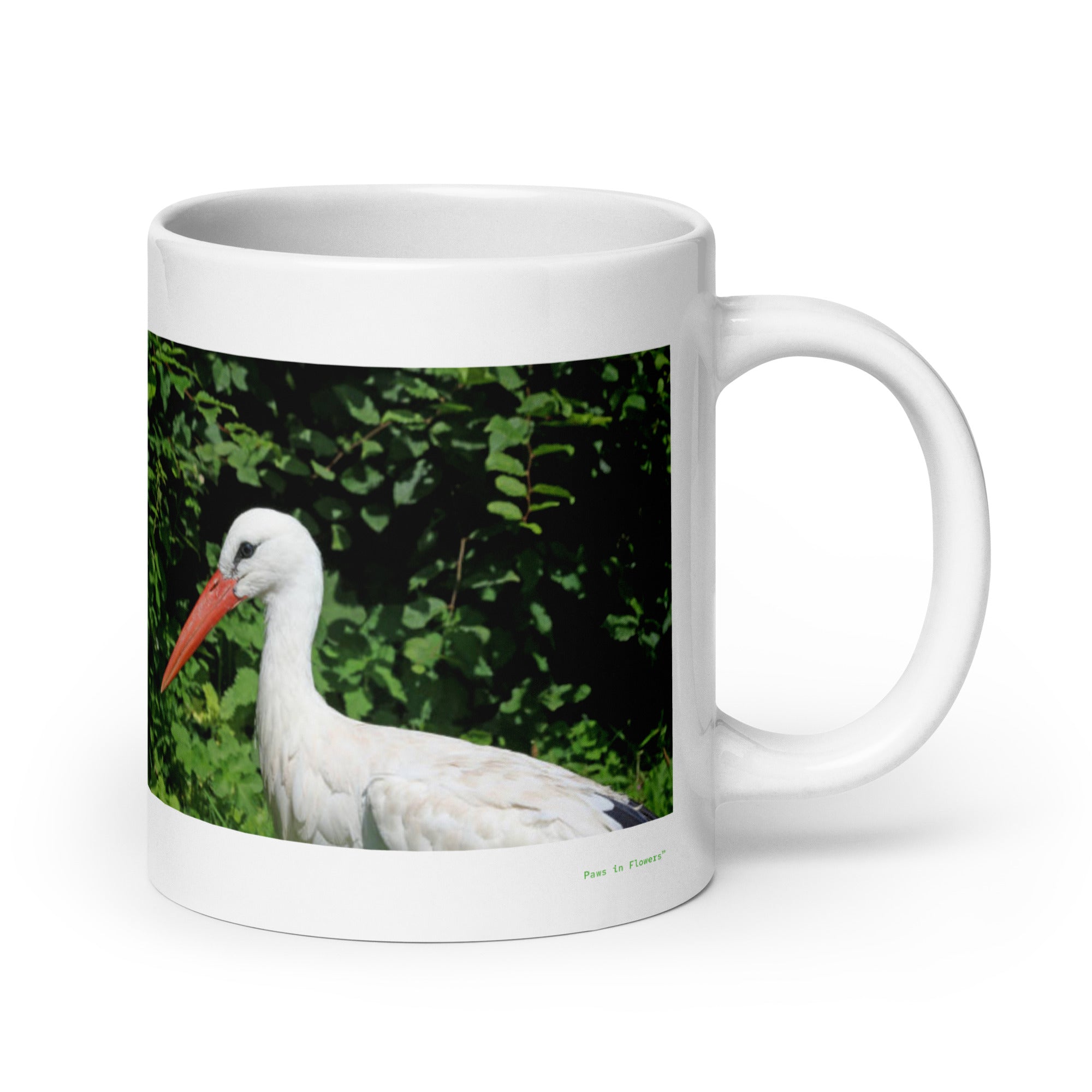 20 oz. white ceramic stork mug showing a stork in its natural habitat